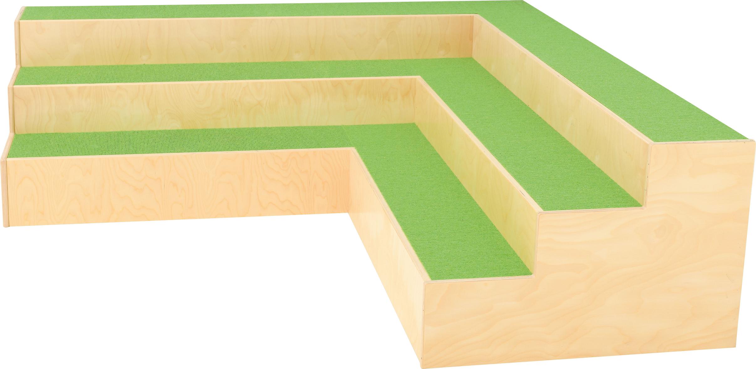 L-förmiges Stufenpodest mit Moosgrün-Tepichoberfläche.